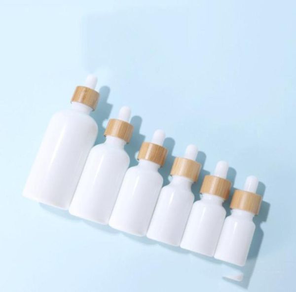 

10ml 15ml 20ml 30ml 50ml 100ml white porcelain empty cosmetic glass dropper bottles serum bottle with bamboo cap3001417
