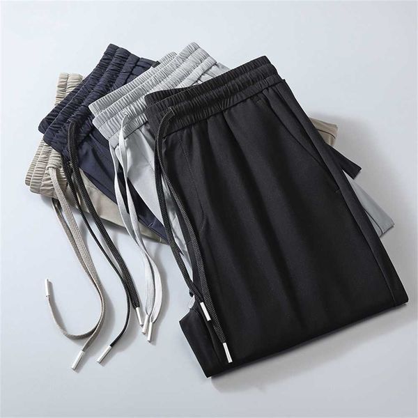 

2022 summer new men's air conditioning ice silk pants loose sports casual high elasticity and quality dad's wearsgazkziy, Black