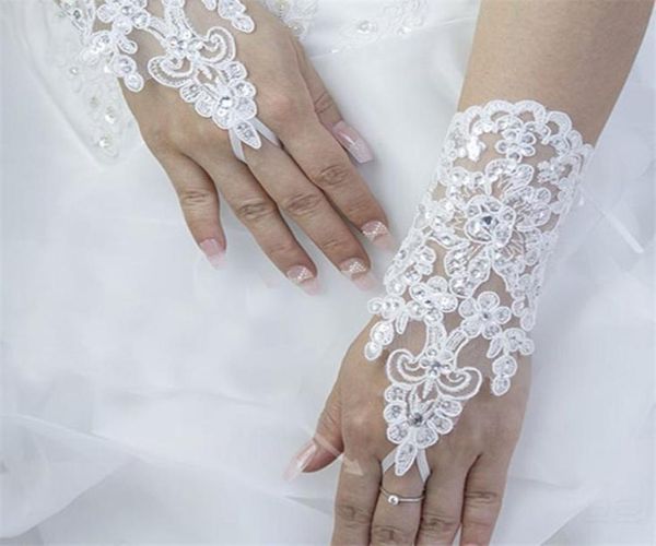 

elegant white lace bridal gloves wrist fingerless short paragraph rhinestone wedding gloves promotion whole low 3321335