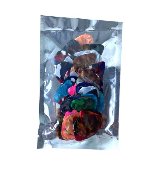 

100pcslot whole guitar picks celluloid 046mm plectrums color mixing4144922
