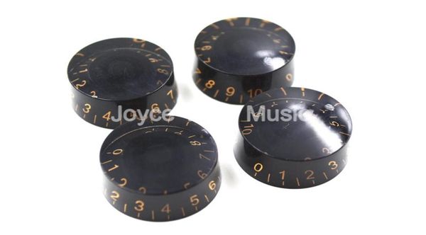 

1 set of 4pcs niko transparent black gold font electric guitar knobs for lp sg style electric guitar wholes9613355