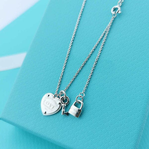 

designer new small luxury tiffay pure silver peach heart lock key necklace love pendant thick plated 18k mijin jewelry