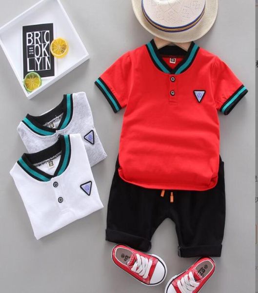 

2021 new summer children039s boy handsome casual stand collar two button triangular label short sleeved shorts twopiece set6727395, Blue