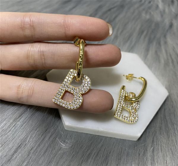 

designer letters charm earring women rhinestone diamond stud hip hop style gold earrings ladies hollow out letter studs7775418, Golden