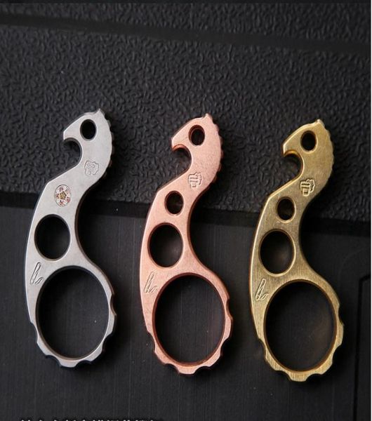 

2021 the portable fashion outdoor women men edc boxing finger protective gear hippocampal titanium alloy wine opener snail key pen6431802