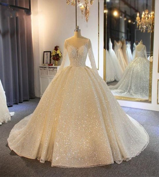 

sparkle ball gown wedding dresses 2020 sheer jewel neck appliqued sequins long sleeves sequined bridal gowns custom made abiti da 2850087, White