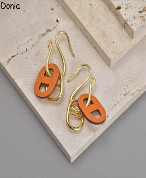 

donia jewelry luxury stud european and american fashion pig nose titanium steel fourcolor creative leather designer earrings gift1636461, Golden;silver