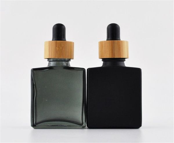 

1oz bamboo lid bottle beard oil 30ml rectangular stamping frosted black glass liquid dropper square with wooden cap4716361