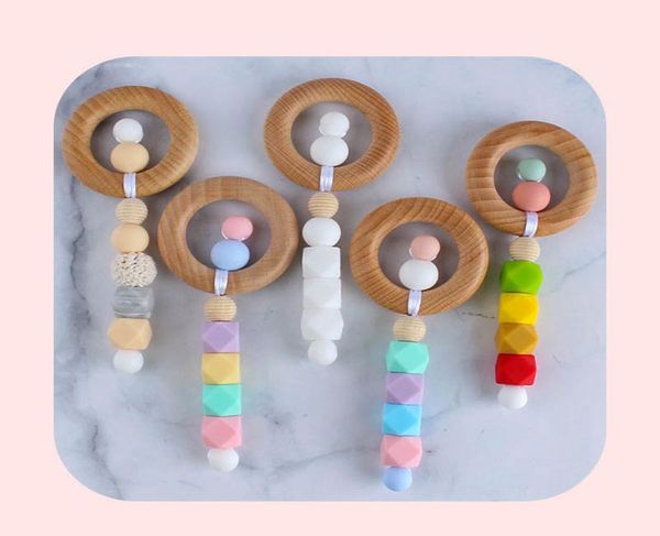 

2021 new diy silicone baby teethers wooden teething training kids teether teething ring handmade natural infant wood ring teethers8154973