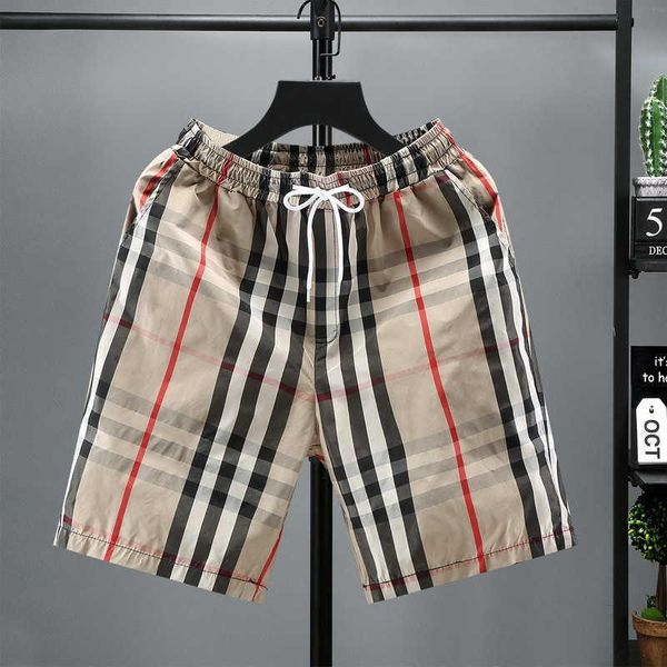 

summer slim fit men's beach pants capris fashion stripe sports shorts men's casual fashion shorts, White;black