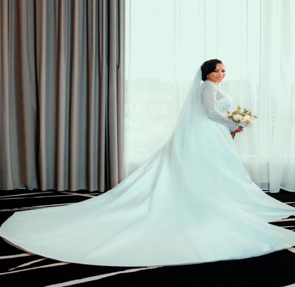 

2021 plus size arabic aso ebi lace beaded mermaid wedding gowns deep vneck long sleeves detachable train bridal dresses zj7748621701, White