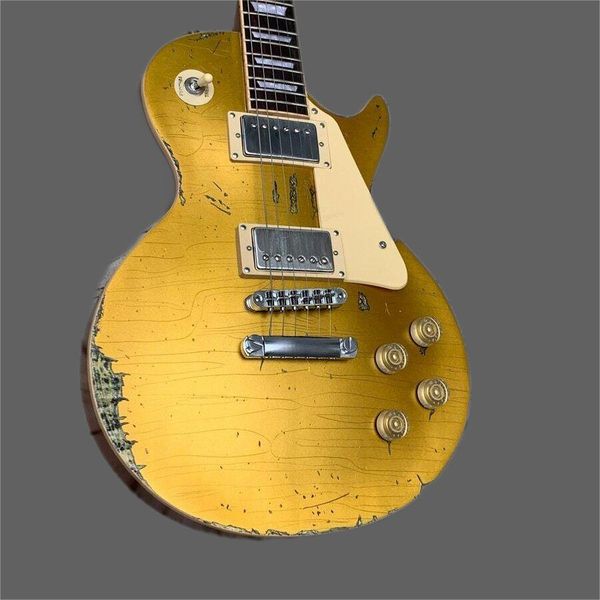 

factory agedheritage nitro finish electric guitar, body and neck a piece of gold