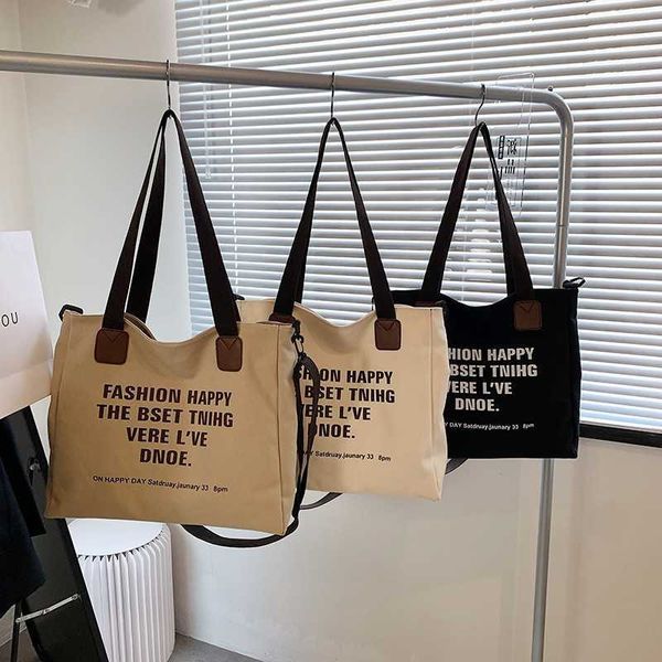 

large capacity westernized bag for women in new trendy and simple canvas bag fashionable college student class single shoulder tote bag