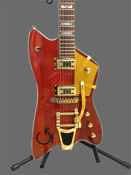 

custom red jazz-rock electric guitar with gold accessories