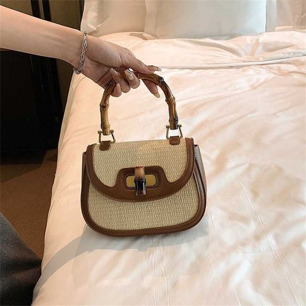 

24% off designer 2023 new grass woven women's casual bamboo handbag contrast saddle single shoulder oblique straddle bag