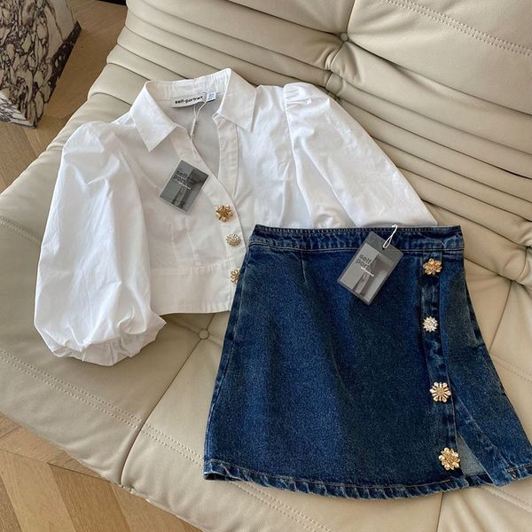 

a niche design bubble sleeve short button button button button shirt with a short high waisted a-line skirt, White