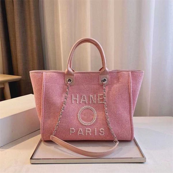 

32% off handbag designer 2023 new xia xiaoxiangfeng candy pearl beach handmade high capacity mommy shopping women's bag