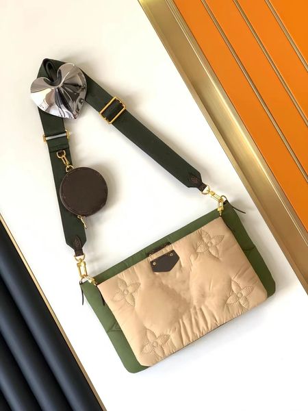 

designer bags the handbag features recycled nylon embroidery on the o paired with printed fabric lining with multiple pockets and compartmen