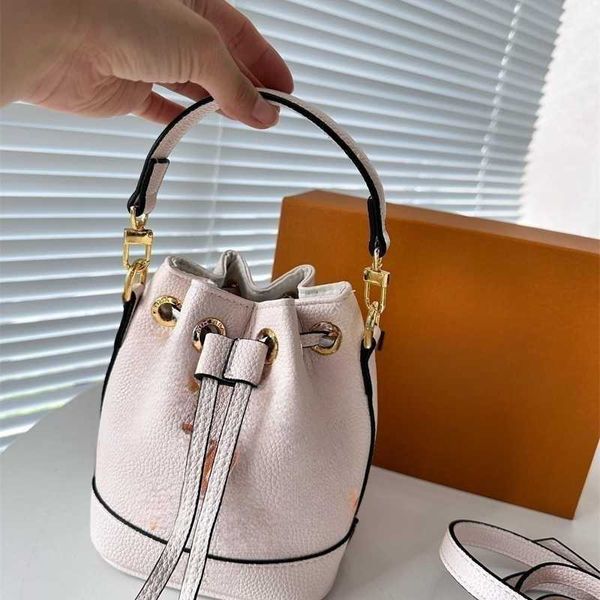 

0a designer bag bucket bag women shoulder crossbody bag designers lvvs bag handbag litchi grain chain decoration tote luxury shopping bags l