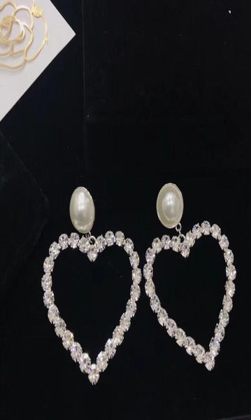 

2018 european and american fashion diamond heart earrings big pearl earrings jewelry counters with the same paragraph 3522913, Golden;silver