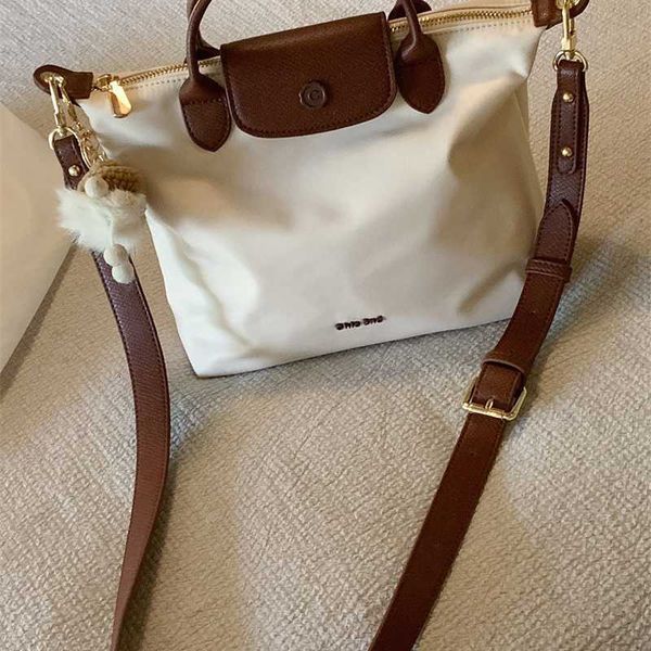 

nanfeng chio2nd large longxiang bag women's summer 2023 new handheld dumpling single shoulder crossbody, Pink;blue