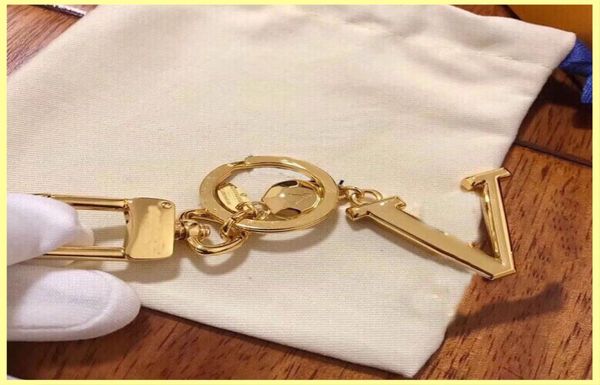 

fashion woman ring mans designer keychains high qualtiy alloy fashionable handmade keychain stylish key buckle bag charm whole9447733, Slivery;golden