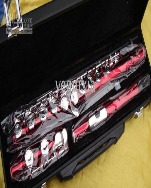

red body silver keys music instrument flute0123456781524146