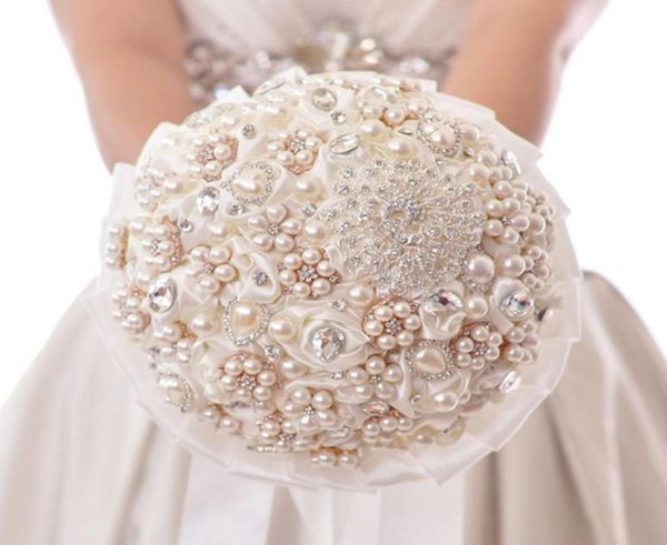 

luxury wedding bridal bouquet with handmade rose pearls and diamonds bride holding flowers 220553