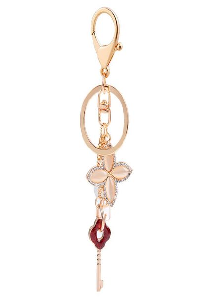 

key lock ring lovers keyring rhinestone opal four leaf clover keychains holder fashion bag pendant car charms keys chains jewelry 6811060, Slivery;golden