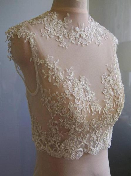 

2016 delicate lace bridal jackets jewel neck cap sleeves illusion appliques tulle white ivory champagne bridal shrugs bolero wrap3167542