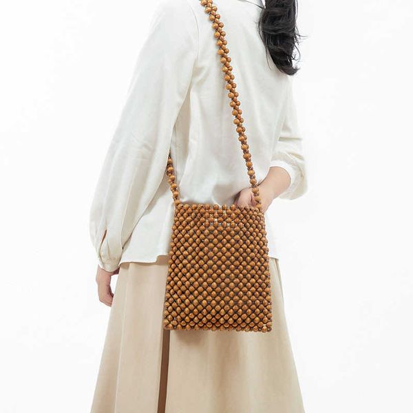 

diagonal straddle one shoulder bag for women's summer crowd design wooden bead bag commuter handwoven bag for women 230718