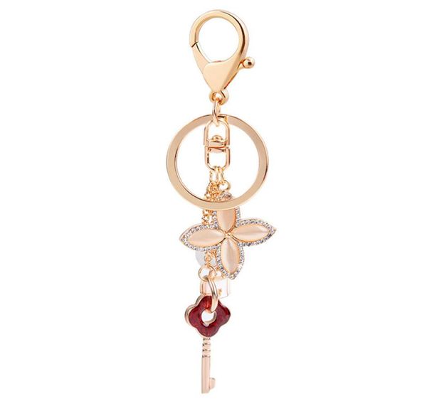 

key lock ring lovers keyring rhinestone opal four leaf clover keychains holder fashion bag pendant car charms keys chains jewelry 1723212, Slivery;golden