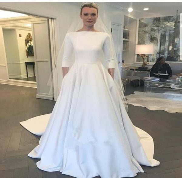 

2019 new meghan markle style a line elegant wedding dresses bateau neck long sleeves sweep train covered buttons back garden brida9186752, White