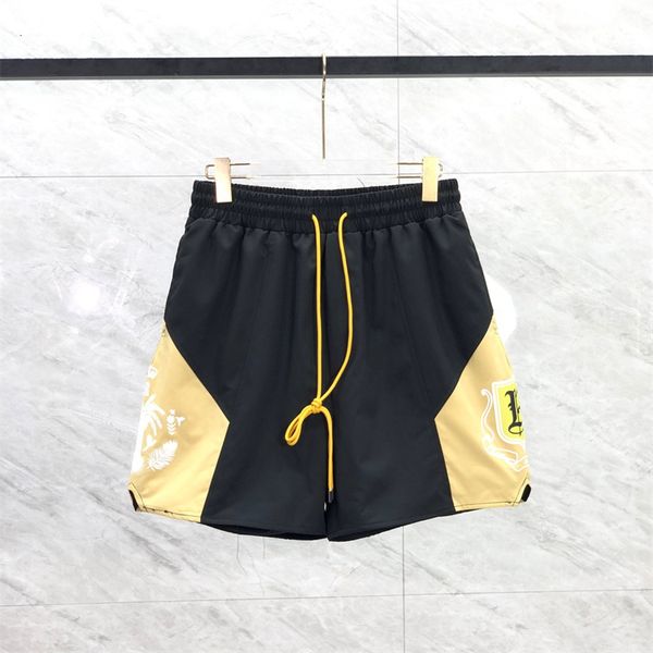 

men's shorts 2023ss black green spliced rhude men women casual stretch pocket drawstring breeches jogger simple printing 230718, White;black