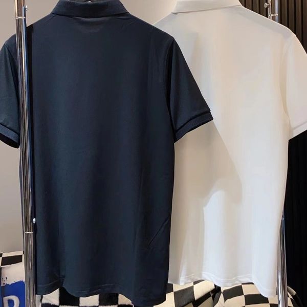 

short button-up sleeves on the chest polo shirt with standing collar embroidered animal logo on chest, White