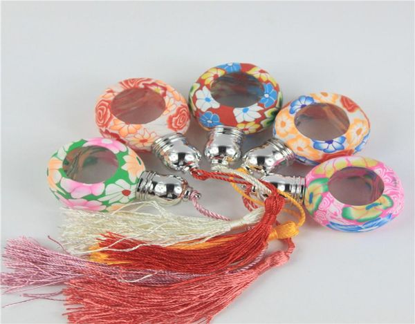 

50pcslot round shape fimo clay perfume bottles glass rollon bottles for essential oils tassels glass perfume bottle whole5222306