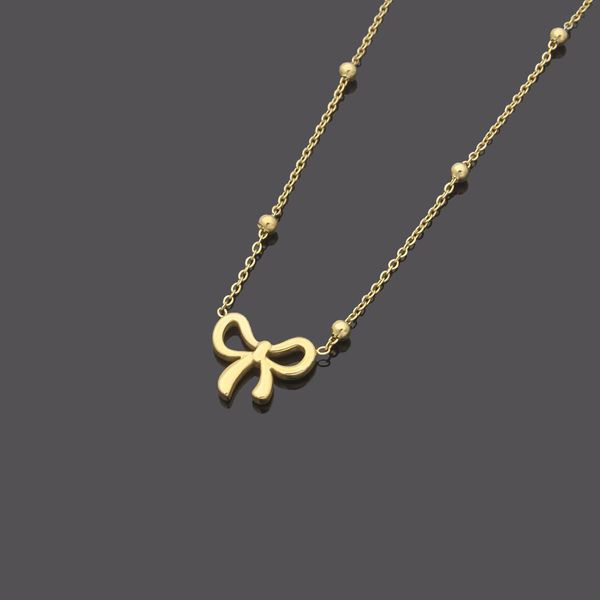 

titanium steel jewelry wholesale hollowed out bow necklaces, Silver