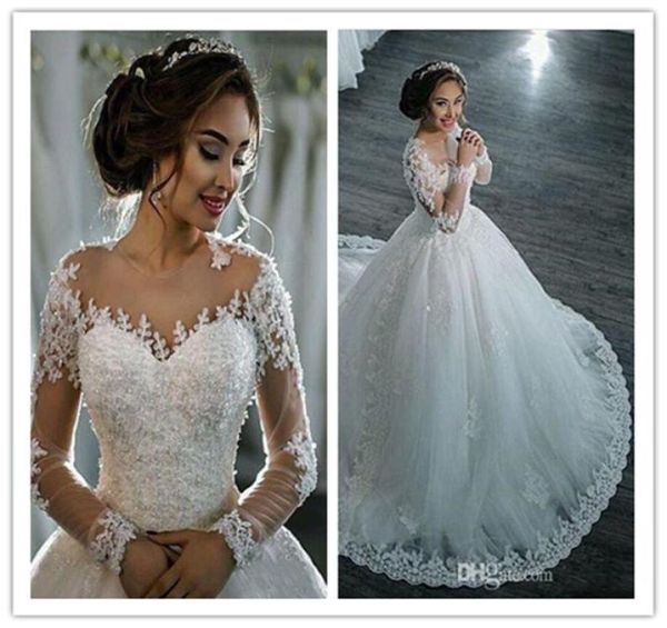 

2021 new dubai elegant long sleeves aline wedding dresses sheer crew neck lace appliques beaded vestios de novia bridal gowns wit6126167, White