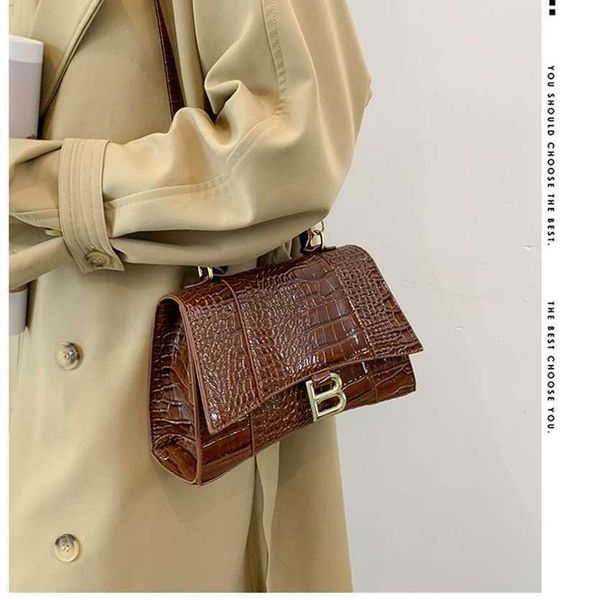 

63% off 2023 new bagdesigner premium textured lacquer leather stone pattern hourglass one shoulder handheld straddle fashion women's ba