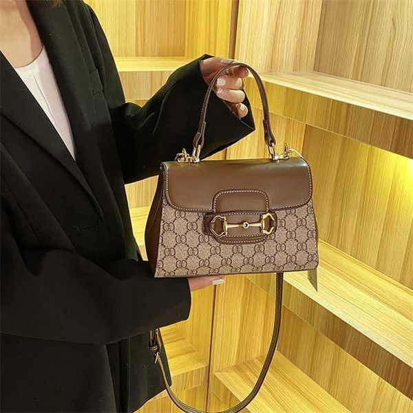 

60% off bag designer luxury and luxurious horseback buckle handbag niche women's new western-style vintage color contrast diagonal cros