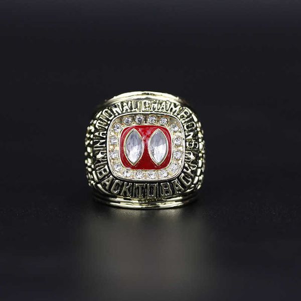 

ncaa 1995 nebraska corn harvester university championship ring, Golden;silver