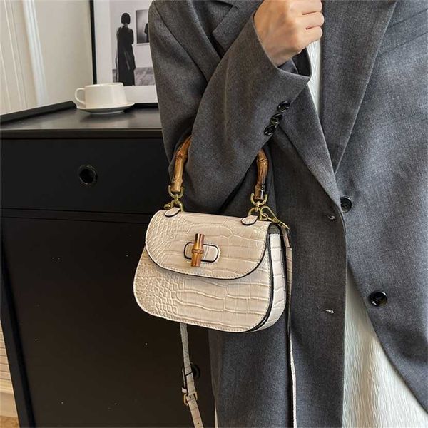 

60% off designer women's new single shoulder saddle with bamboo joint small and simple crossbody bag