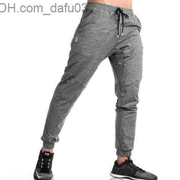 

men's pants autumn winter new men pants gyms casual elastic mens fitness workout pants skinny sweatpants trousers jogger pants with m-x, Black