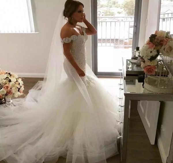 

2020 luxury mermaid wedding dresses lace appliques beads off shoulder tiered ruffles sweep train plus size wedding dress formal br8879115, White