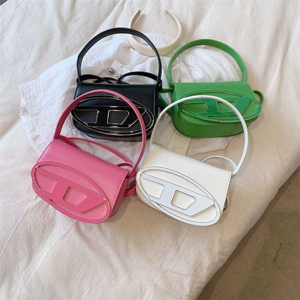 

22% off handbag designer 2023 small design underarm dingdang early spring new solid color one shoulder crossbody handheld mini bag