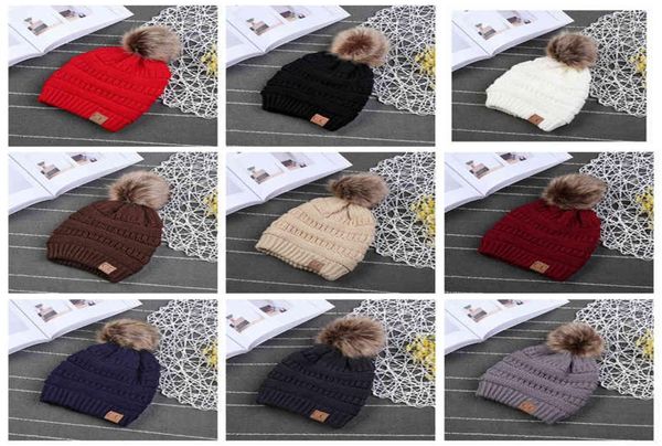 

kids cc trendy hats kids knitted fur poms beanie winter luxury cable slouchy skull caps fashion beanie outdoor hats 50pcs1419073