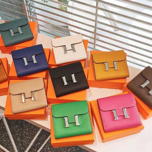 

lychee grain kangkang short clip selling new exquisite layer cowhide pig nose chain crossbody handbag