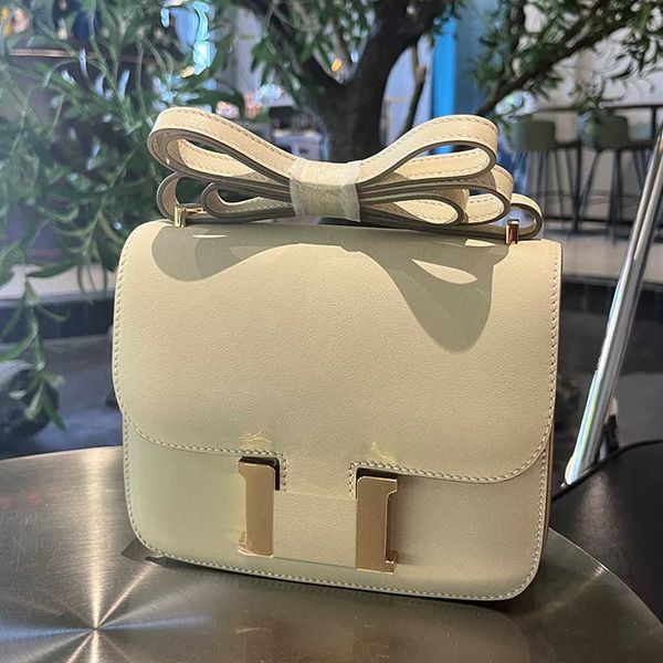 

genuine leather buckle kangkang bag for female flight attendants high-end and versatile one shoulder crossbody tofu bag box bag cowhide smal