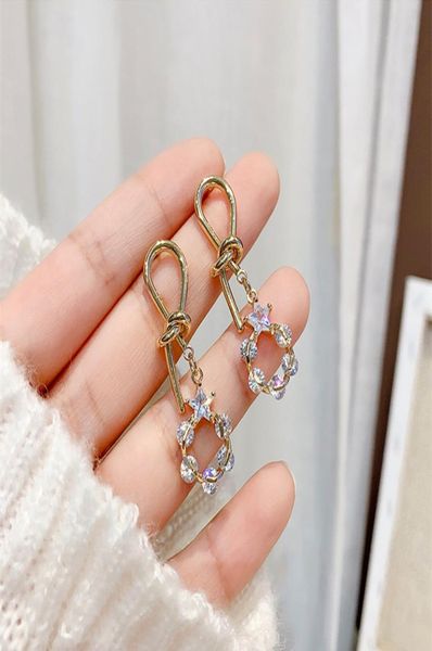 

high sense female audience cool style retro earrings east gate silver needle knotting earrings korean earrings whole9106168, Golden