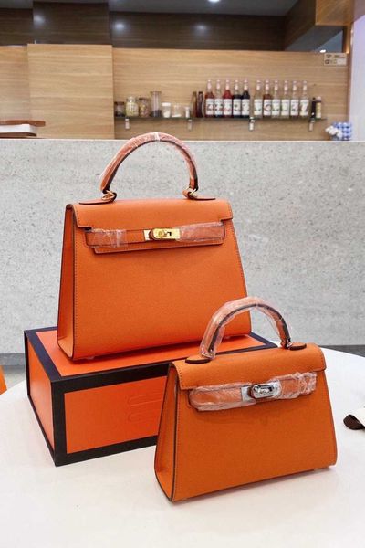 

new women's cross cowhide kelly bag portable briefcase